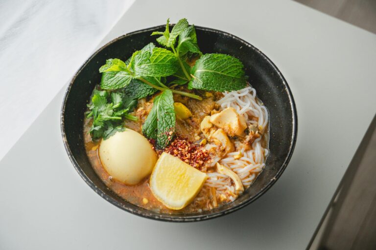 Laksa: Origins, Regional Variations, and Where to Eat It
